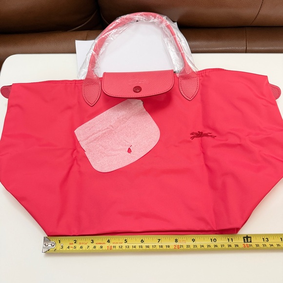 Longchamp top handle short handle tote
Grenade
L1623619P35 - Picture 8 of 12